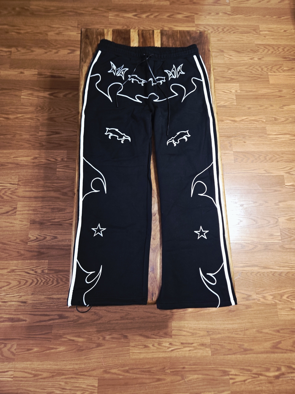 RtA Men's Owen Black Sweatpants with White Star And Tribal Design. Size XL